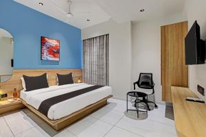 TV a/nebo společenská místnost v ubytování HOTEL LEE PLATINUM + 19 fotografií