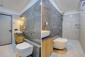 ein Bad mit einem WC, einem Waschbecken und einer Dusche in der Unterkunft HOTEL LEE PLATINUM in Ahmedabad