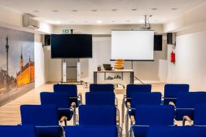 TV a/nebo společenská místnost v ubytování Hotel Zielonki