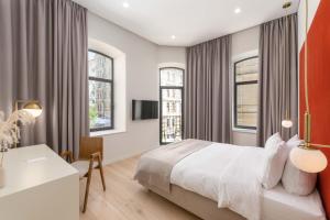 Postel nebo postele na pokoji v ubytování Sophia Hotel Kyiv + 37 fotografií