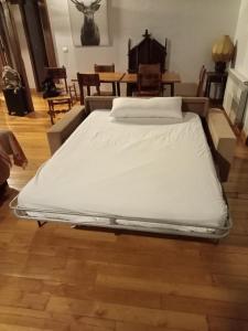 מיטה או מיטות בחדר ב-Casa Cahecho
