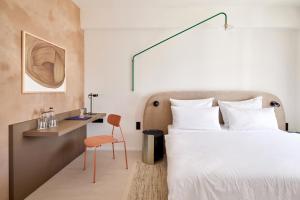 Postel nebo postele na pokoji v ubytování Hotel PERK + 37 fotografií