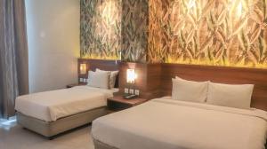 Katil atau katil-katil dalam bilik di Pakons Prime Hotel
