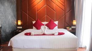 Katil atau katil-katil dalam bilik di Pakons Prime Hotel