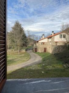 a view from a window of a house at Bonito apartamento en Ezcaray in Azarrulla +4 photos