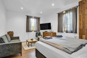 Postel nebo postele na pokoji v ubytování Apartmány Ochsendorf - Pod Strání