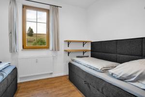 Postel nebo postele na pokoji v ubytování Apartmány Ochsendorf - Pod Strání