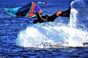 a person on a board in the water at Il Salvatore in Masainas +25 photos