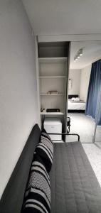 a room with a bed in a room with a bedroom at Cer de munte in Nucşoara +8 photos