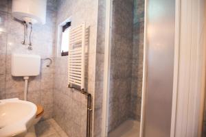 Ванная комната в Apartmani Nada & Darko, Kampor, Rab, Hrvatska