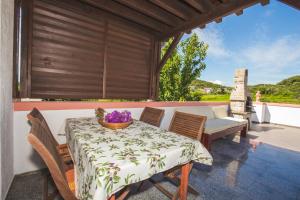 Балкон или терраса в Apartmani Nada & Darko, Kampor, Rab, Hrvatska