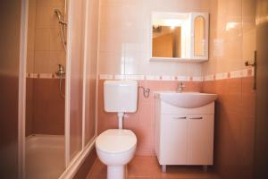 Ванная комната в Apartmani Nada & Darko, Kampor, Rab, Hrvatska