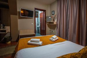 Letto o letti in una camera di Bell Inn