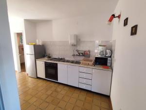 Kuchyň nebo kuchyňský kout v ubytování Apartment Nanica Prigradica