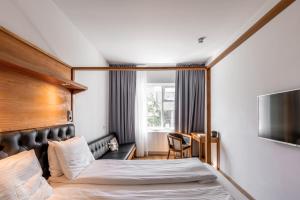 Postel nebo postele na pokoji v ubytování Hotel Von