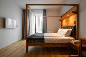 Hotel Von tesisinde bir odada yatak veya yataklar