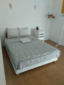 Ένα ή περισσότερα κρεβάτια σε δωμάτιο στο Restelo House Shared Appartment
