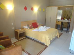 Katil atau katil-katil dalam bilik di Arthur Palace Hotel
