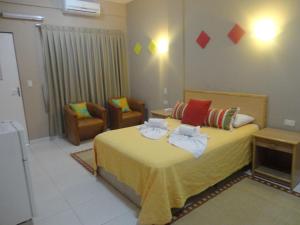 Katil atau katil-katil dalam bilik di Arthur Palace Hotel