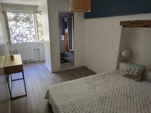 Postel nebo postele na pokoji v ubytování Appartement, port de Binic