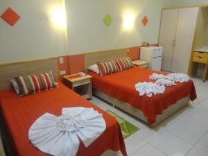 Katil atau katil-katil dalam bilik di Arthur Palace Hotel