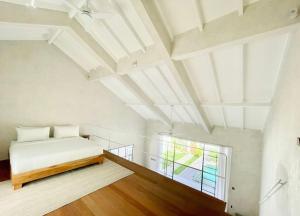 Ένα ή περισσότερα κρεβάτια σε δωμάτιο στο Villa Sonder 1, Stylish 1 BR loft with private pool +18 φωτογραφίες