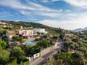a view of a village with a road and houses at Estate4home - Villa Maria Rosaria in Massa Lubrense