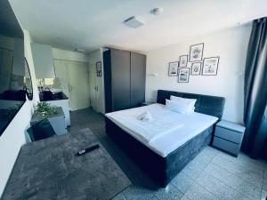 Tempat tidur dalam kamar di Lipp Apartments