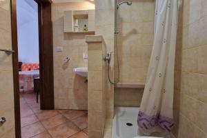 Et badeværelse på Comodissima casa per vacanza