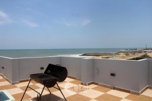 Balkon oz. terasa v nastanitvi Sea Breeze at ECR - Beach Front Villa with Private Pool, Jacuzzi and Dive-in Theater