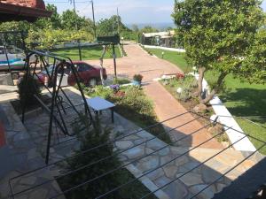 a view of a garden with a playground at PARADISE VILLA in Litochoro