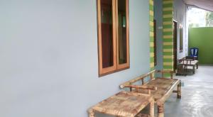 Χώρος καθιστικού στο Penginapan Asri Guest house