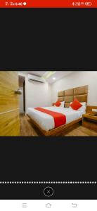 Postel nebo postele na pokoji v ubytování HOTEL SAFARI INN