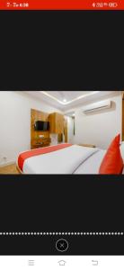 Postel nebo postele na pokoji v ubytování HOTEL SAFARI INN