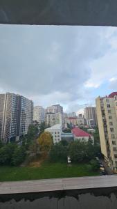 a view of a city with tall buildings at Apartament in Batumi