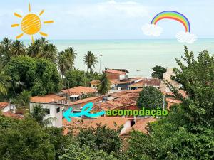 widok na miasto z tęczą i ocean w obiekcie Mar & Sol Residence-Praia da Penha w mieście João Pessoa