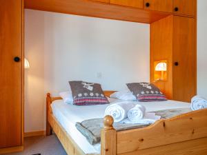 Ένα ή περισσότερα κρεβάτια σε δωμάτιο στο Apartment Christiania 2 B7 by Interhome
