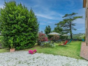 A garden outside Apartment Villa Caggio-1 by Interhome