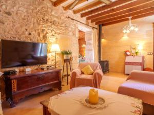 Телевизор и/или развлекательный центр в Holiday Home Ca sa Padrina by Interhome