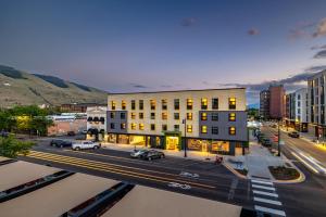 a building on a city street with cars parked in front at The Wren in Missoula