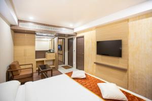 TV a/nebo společenská místnost v ubytování Lee-Benz ARK HOTEL