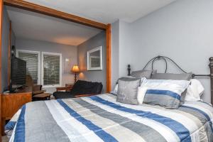 a bedroom with a bed and a desk and a chair at Villages of Wisp 08 Winding Way in McHenry