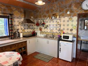 Kuchyň nebo kuchyňský kout v ubytování Cortijo el llano + 11 fotografií