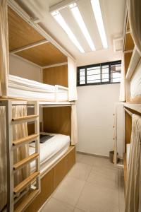 Postel nebo postele na pokoji v ubytování BOHOSTEL