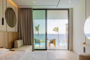Voodi või voodid majutusasutuse BEYOND A Luxury Boutique Hotel toas