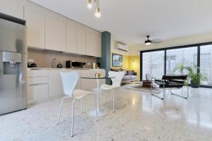 Kuchyň nebo kuchyňský kout v ubytování La Moderna by Wynwood House