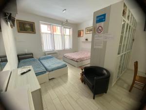 Łóżko lub łóżka w pokoju w obiekcie Appartamento House Apartment Tabe Centro Bologna
