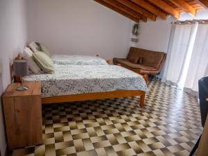 Кровать или кровати в номере Casa D'Olívia