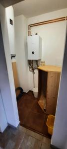 a bathroom with a toilet and a sink in a room at Apartmán Kořenov in Kořenov