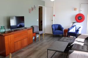 Televiisor ja/või meelelahutuskeskus majutusasutuses Grímsstaðir holiday home - Family friendly